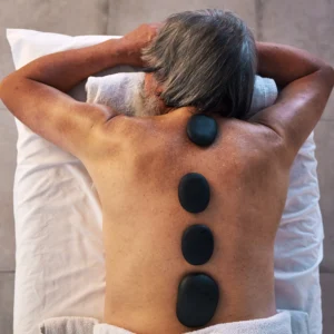 Masaje con piedras calientes espalda & cuello
